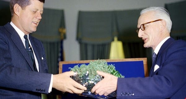 Ambassador Thomas Kiernan of Ireland presents a bowl of Irish shamrock to President John F Kennedy in 1961.